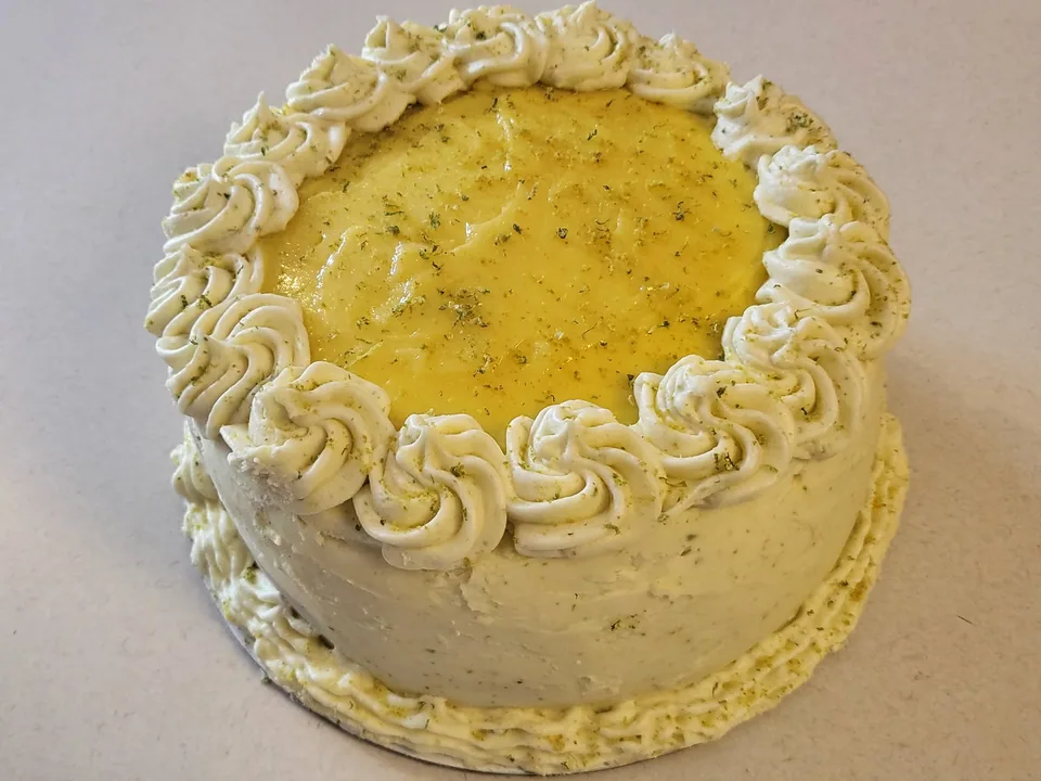 Round cream dessert with a piped border