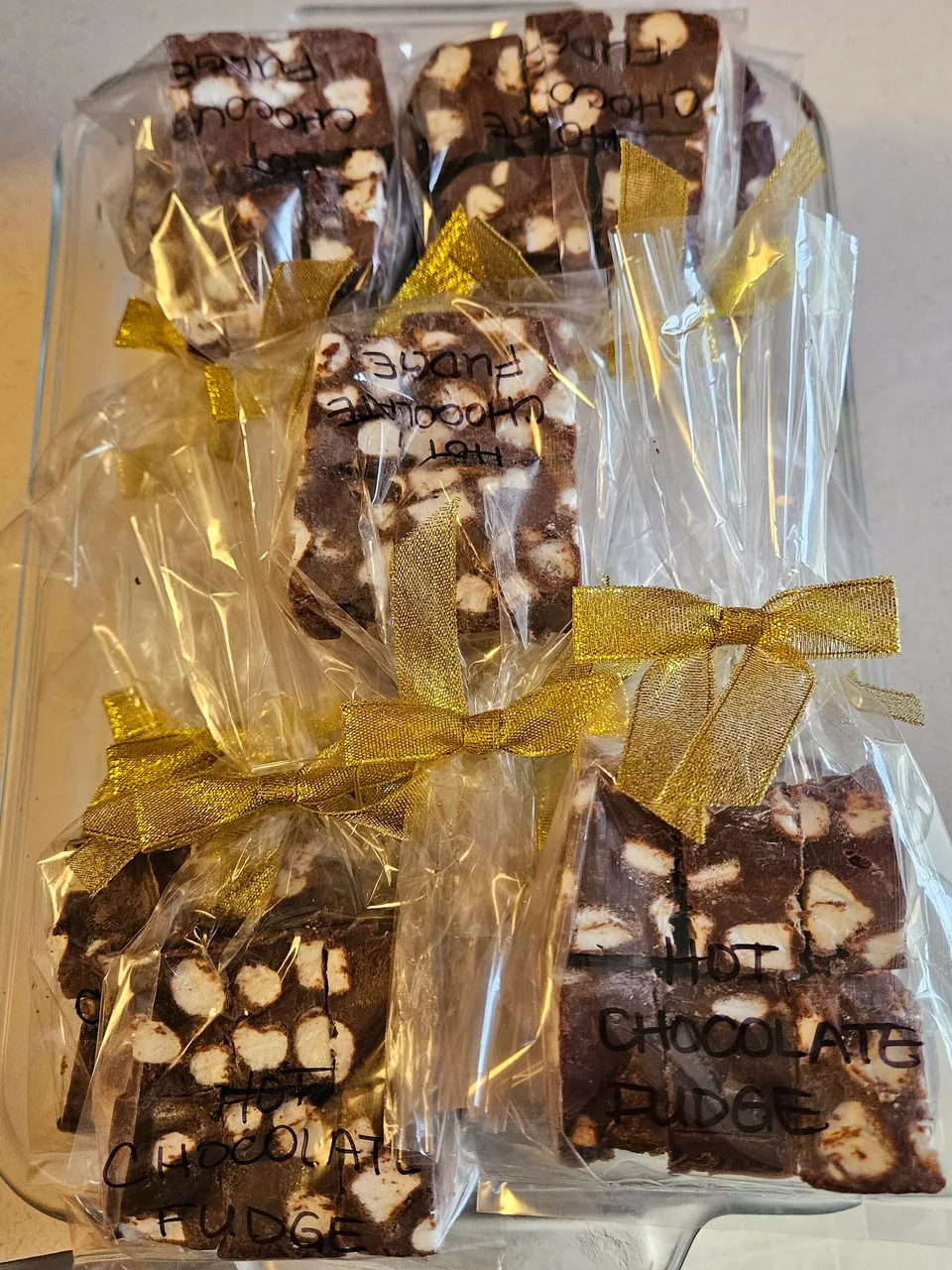 Gift bags of hot chocolate fudge with marshmallow pieces