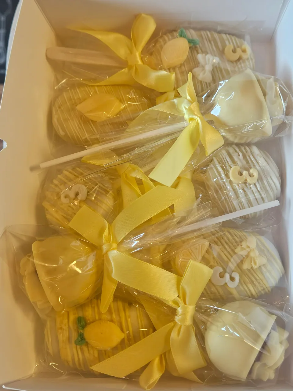Box of individually wrapped lemon-themed cake pops