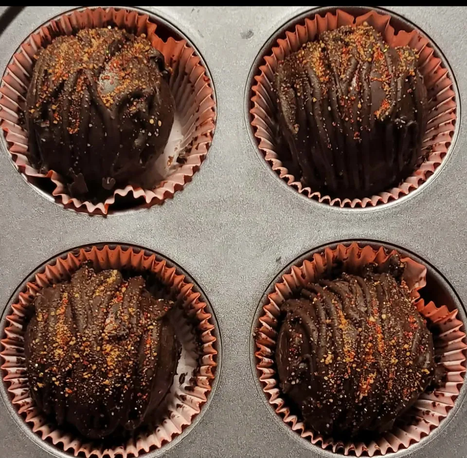 Mexican hot chocolate bombs with dark chocolate drizzle and spiced sugar