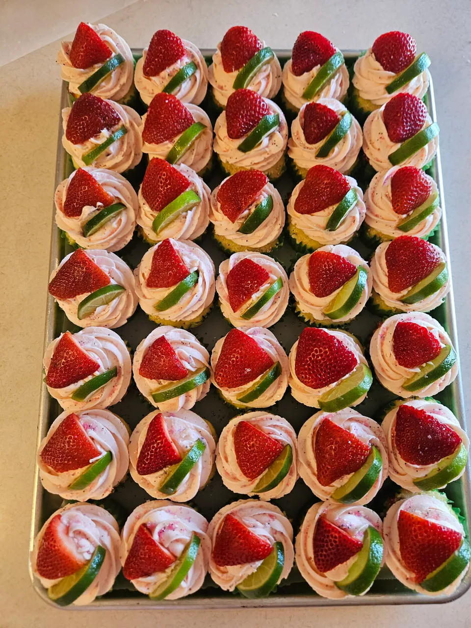 Cupcakes decorated in bright watermelon colors