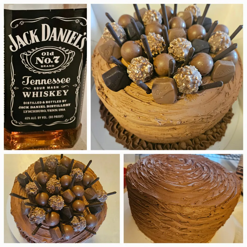 Chocolate-dipped cake pops arranged on a frosted cake
